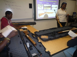 Marksman team in a classroom learning 